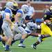 Michigan running back Fitzgerald Toussaint runs the ball for yards  during the first half at Michigan Stadium on Saturday. Melanie Maxwell I AnnArbor.com